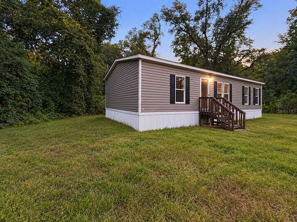4 Acres of Land with Home for Sale in Wellborn, Florida