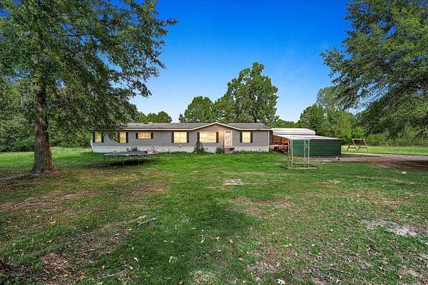 6.4 Acres of Land with Home for Sale in Mooringsport, Louisiana