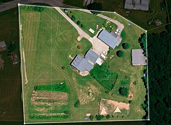 3.28 Acres of Land with Home for Sale in Brush Creek, Tennessee