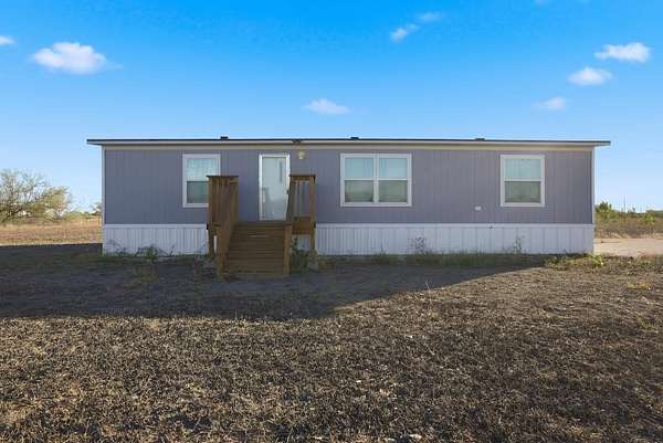 1.66 Acres of Land with Home for Sale in Orange Grove, Texas