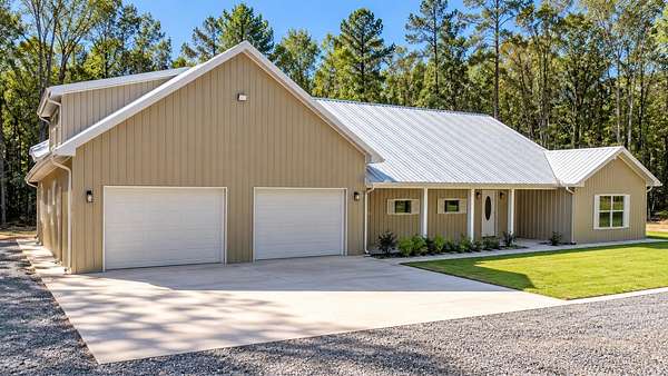13.5 Acres of Recreational Land with Home for Sale in Atlanta, Texas