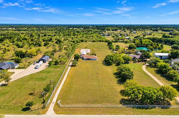 5 Acres of Land with Home for Sale in Scurry, Texas
