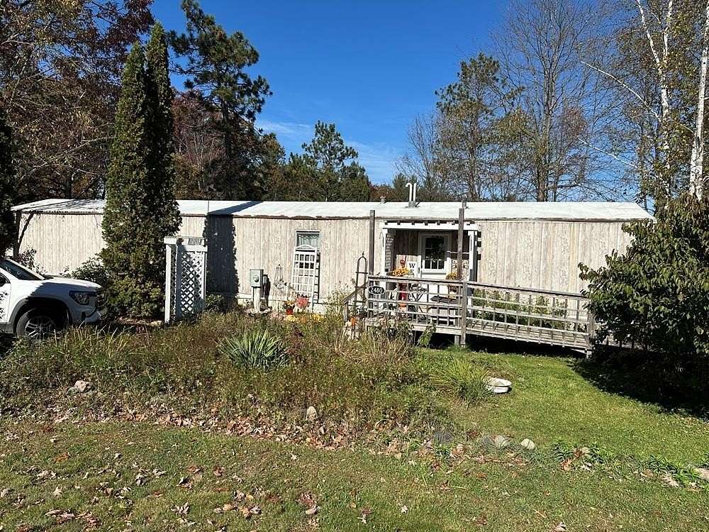 2 Acres of Land with Home for Sale in Harrison, Michigan