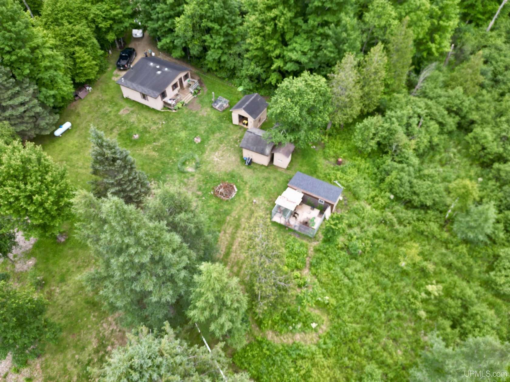 40 Acres of Recreational Land with Home for Sale in Rapid River, Michigan