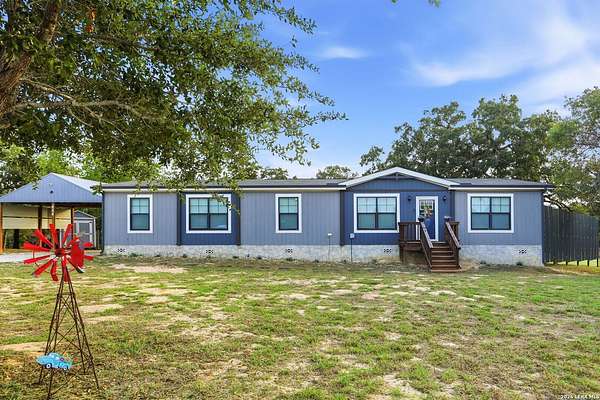 2.32 Acres of Land with Home for Sale in Floresville, Texas