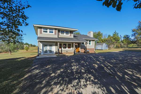 9.3 Acres of Land with Home for Sale in Cross Plains, Tennessee