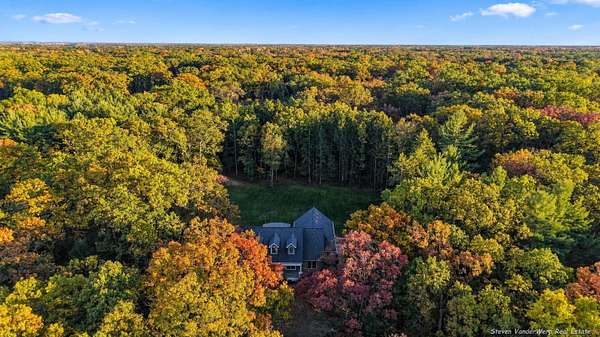 5.1 Acres of Land with Home for Sale in Fruitport, Michigan
