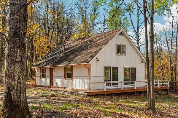 10.5 Acres of Recreational Land with Home for Sale in Elmira, Michigan
