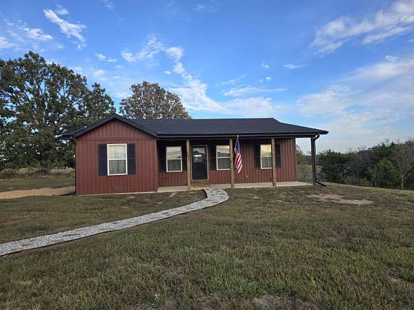 5.7 Acres of Land with Home for Sale in Mansfield, Missouri
