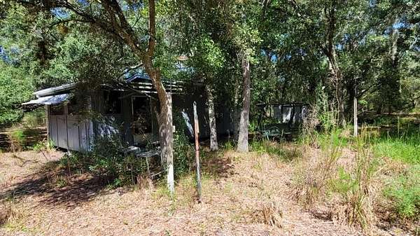 1.25 Acres of Land with Home for Sale in Okeechobee, Florida