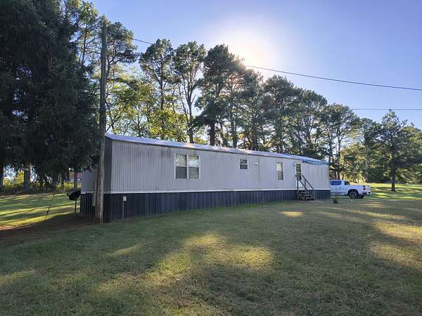 2 Acres of Land with Home for Sale in Cedar Hill, Tennessee