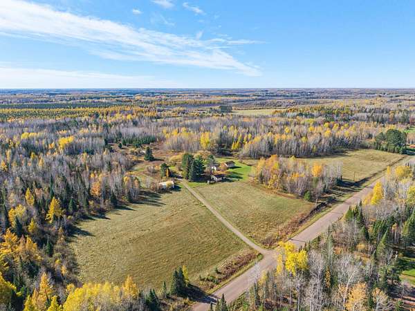 66 Acres of Recreational Land with Home for Sale in Cromwell, Minnesota