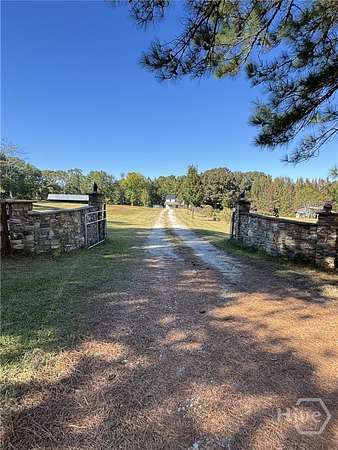 13.5 Acres of Land with Home for Sale in Colbert, Georgia