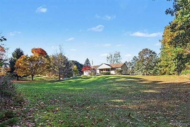 10 Acres of Land with Home for Sale in Tyrone Township, Michigan