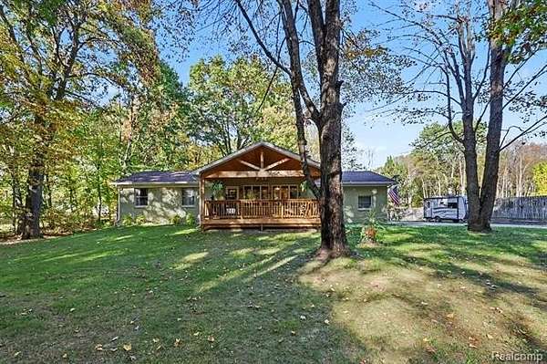 2.5 Acres of Land with Home for Sale in Groveland Township, Michigan
