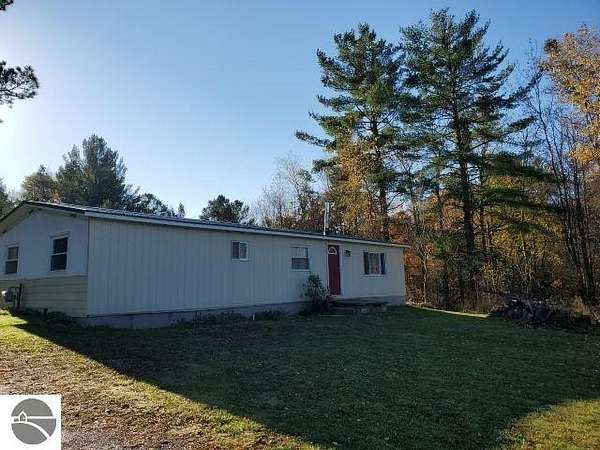1.74 Acres of Land with Home for Sale in Whittemore, Michigan