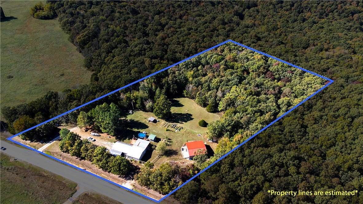 4.19 Acres of Land with Home for Sale in Witter, Arkansas