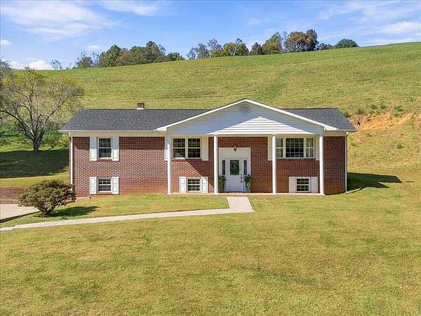 24.9 Acres of Agricultural Land with Home for Sale in Sneedville, Tennessee