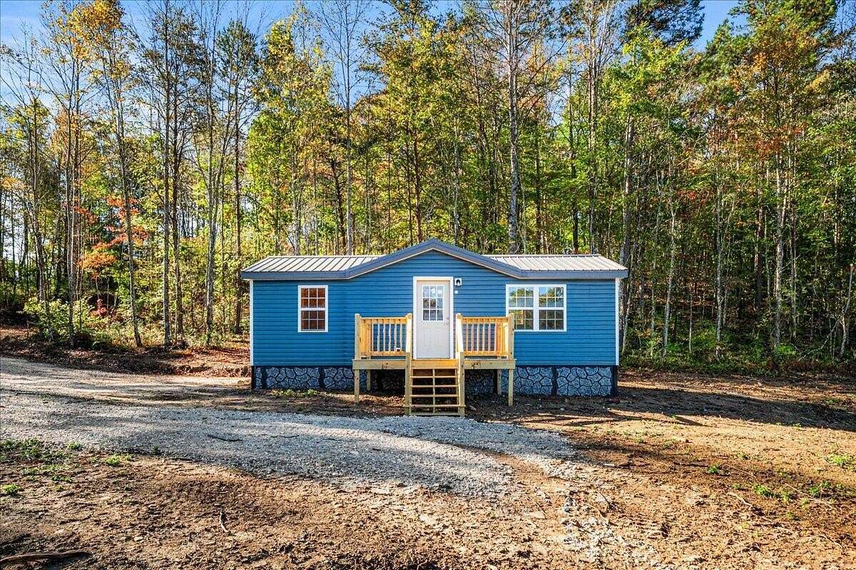 7.26 Acres of Land with Home for Sale in East Bernstadt, Kentucky