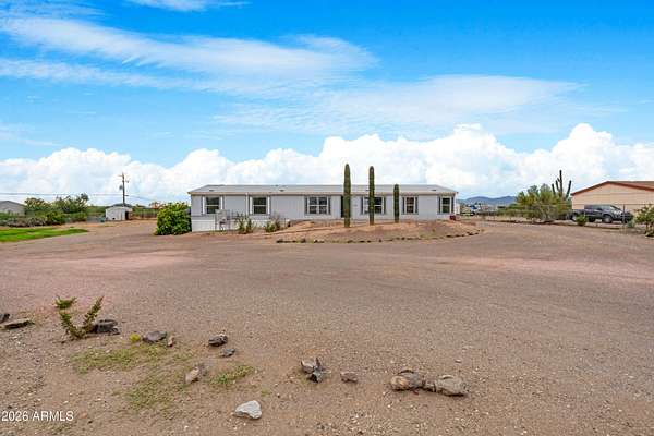 1.68 Acres of Land with Home for Sale in Surprise, Arizona