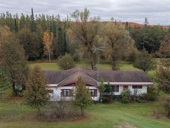 24 Acres of Land with Home for Sale in Boyne Falls, Michigan