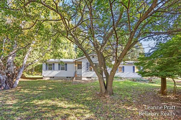 11 Acres of Land with Home for Sale in Manistee, Michigan