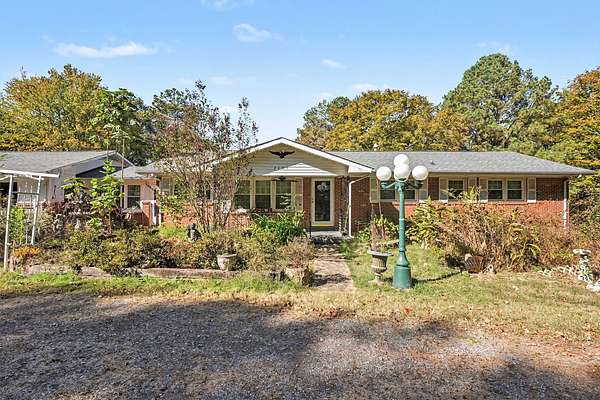 6.83 Acres of Land with Home for Sale in Cumberland Furnace, Tennessee