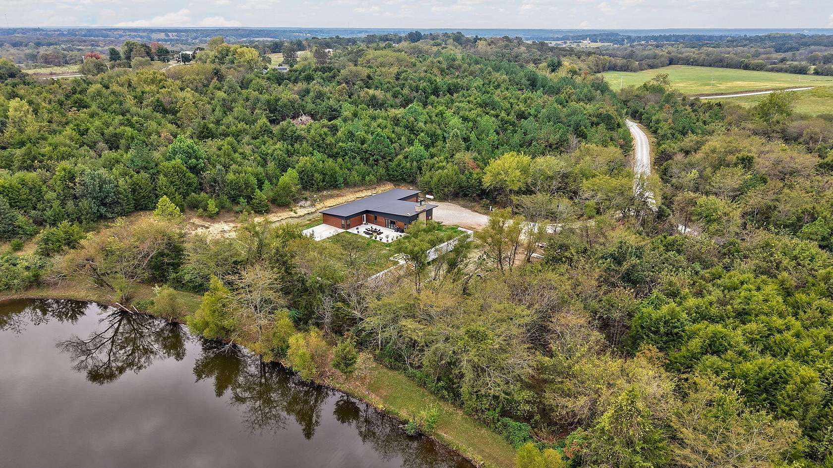 5.7 Acres of Land with Home for Sale in Marshfield, Missouri