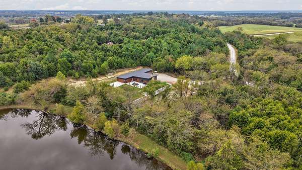 5.7 Acres of Land with Home for Sale in Marshfield, Missouri