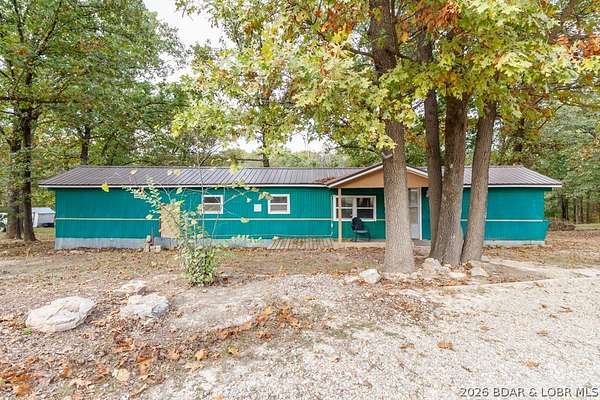 5 Acres of Land with Home for Sale in Lebanon, Missouri
