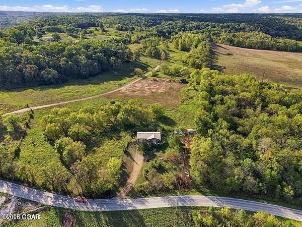 0.7 Acres of Commercial Land for Sale in Pineville, Missouri