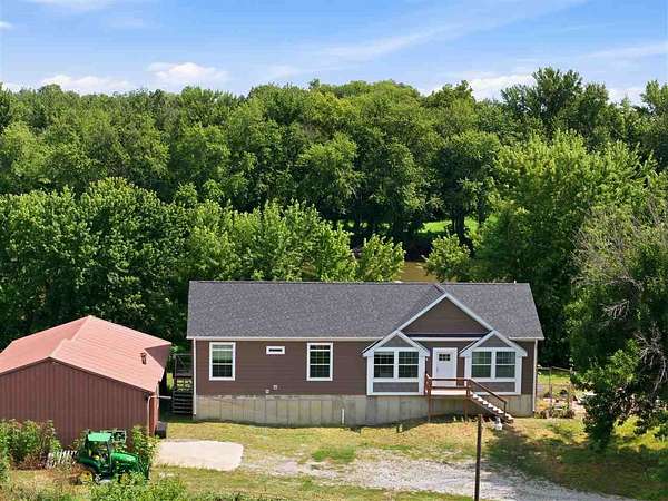 23.7 Acres of Land with Home for Sale in Riverside, Iowa