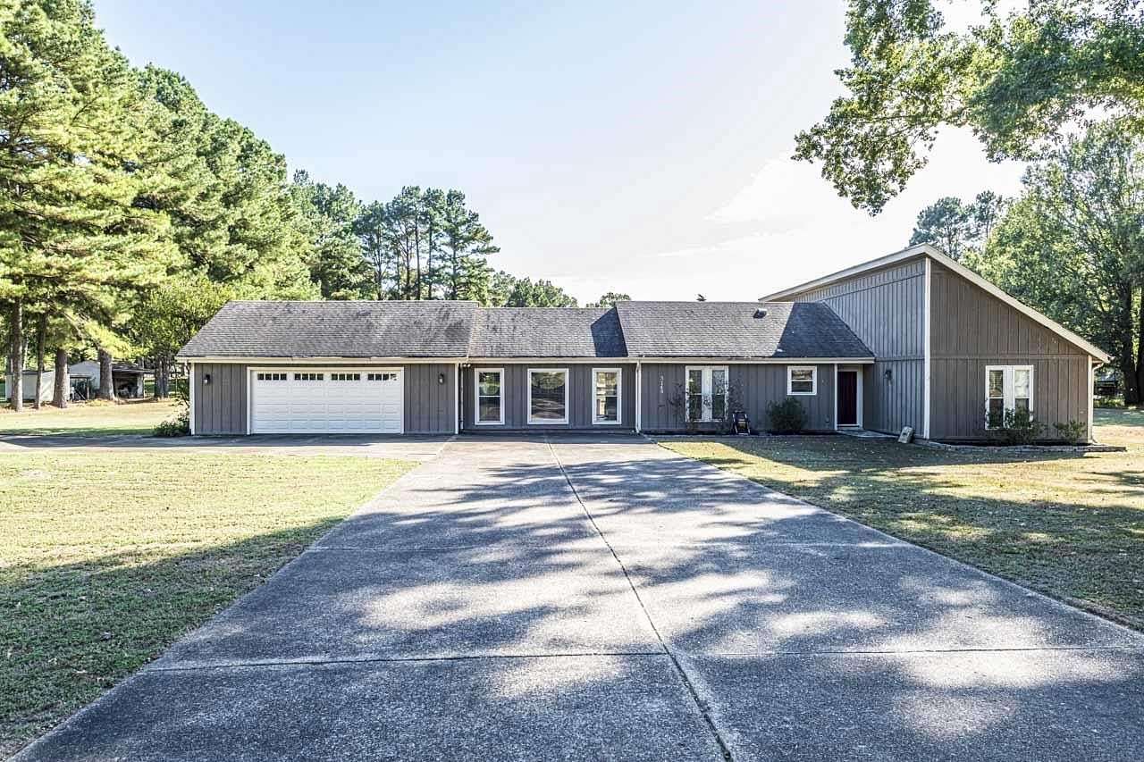 1.9 Acres of Land with Home for Sale in Millington, Tennessee