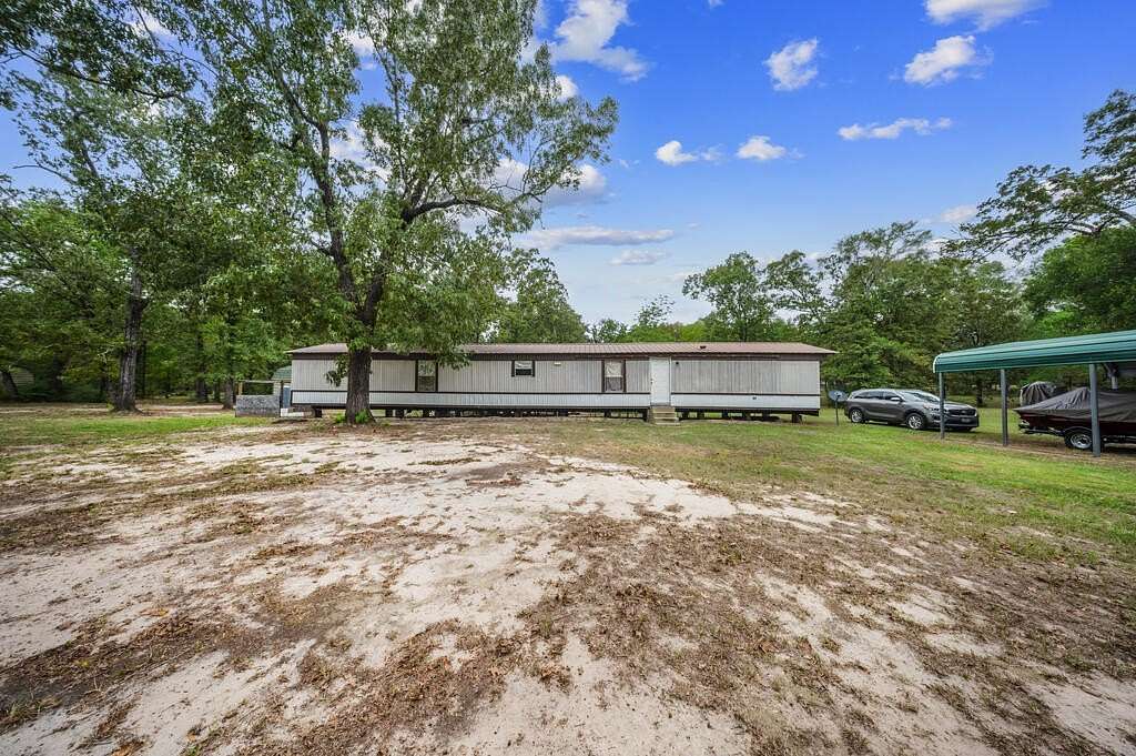 2.23 Acres of Land with Home for Sale in Broaddus, Texas