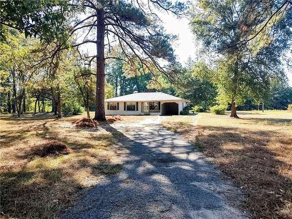 9.22 Acres of Land with Home for Sale in Campti, Louisiana