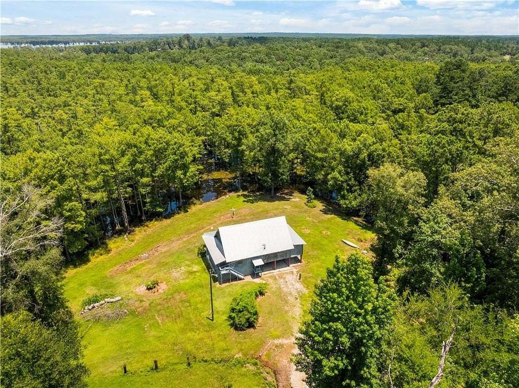 3.2 Acres of Land with Home for Sale in Colfax, Louisiana