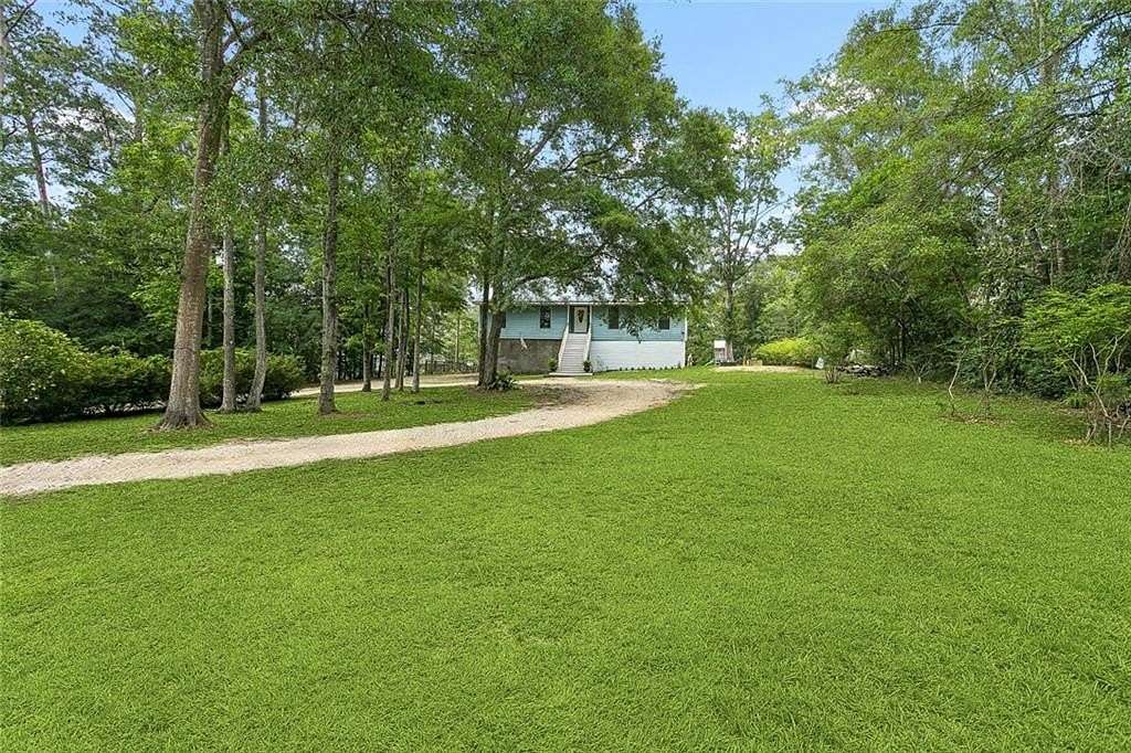 2.29 Acres of Land with Home for Sale in Pearl River, Louisiana