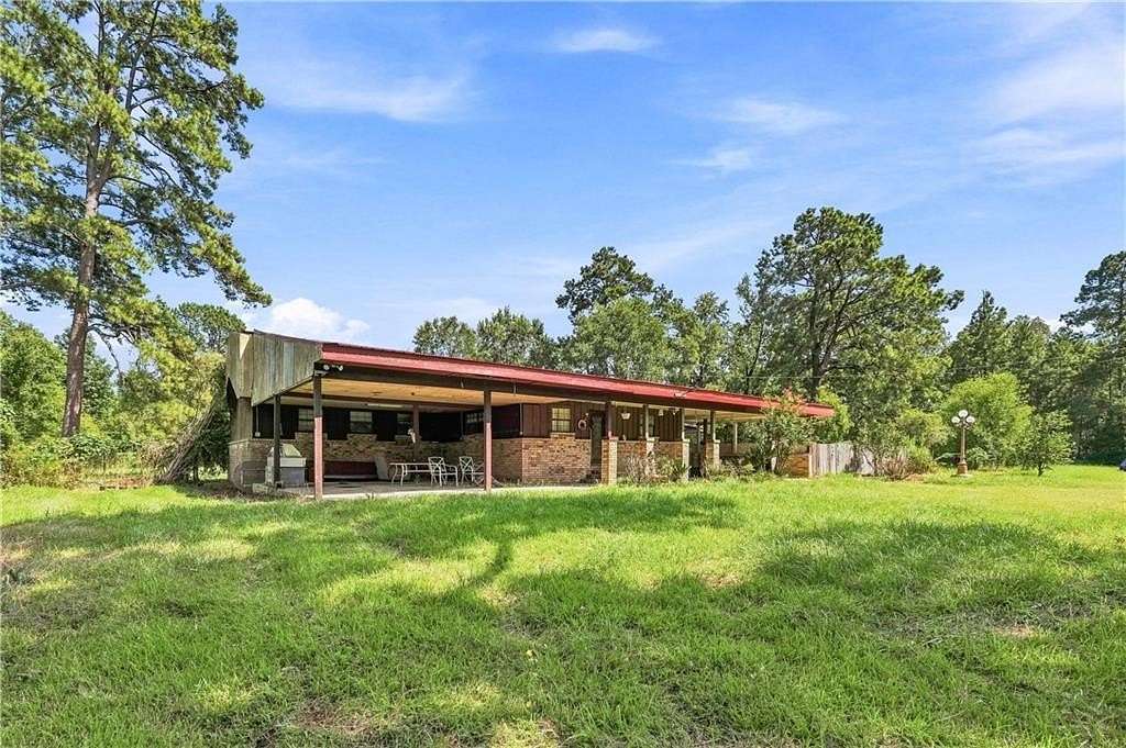 9.8 Acres of Land with Home for Sale in Pineville, Louisiana