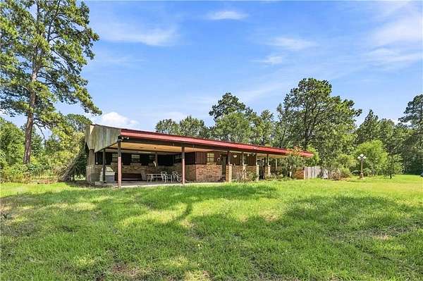 9.8 Acres of Land with Home for Sale in Pineville, Louisiana