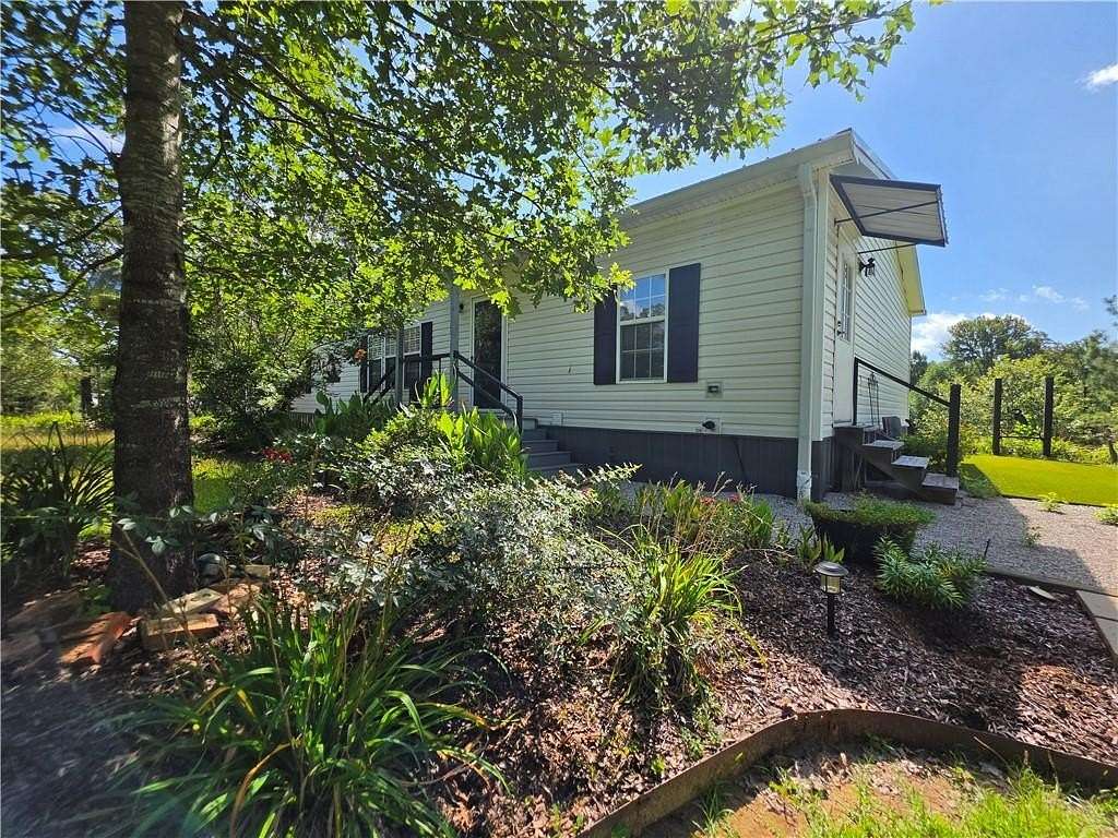 3.15 Acres of Land with Home for Sale in Colfax, Louisiana