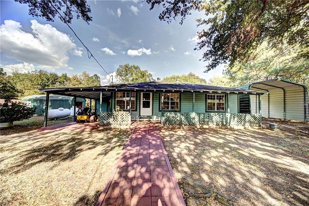 10.9 Acres of Land with Home for Sale in Robeline, Louisiana