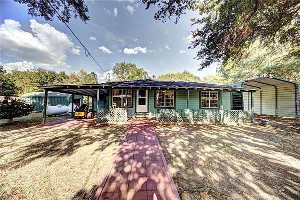 10.9 Acres of Land with Home for Sale in Robeline, Louisiana