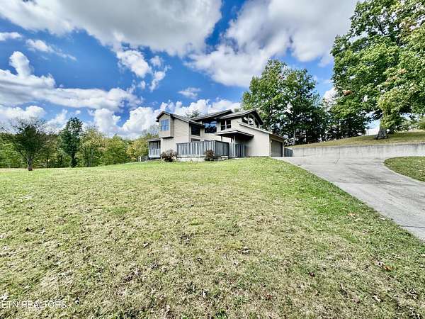 7.46 Acres of Land with Home for Auction in Winfield, Tennessee