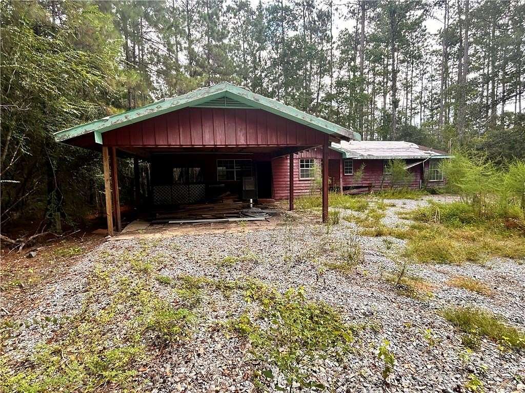 2.67 Acres of Land with Home for Sale in Lacombe, Louisiana