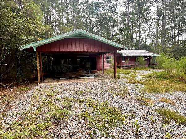 2.67 Acres of Land with Home for Sale in Lacombe, Louisiana