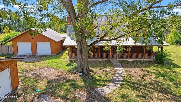 5.87 Acres of Land with Home for Sale in Cottondale, Florida