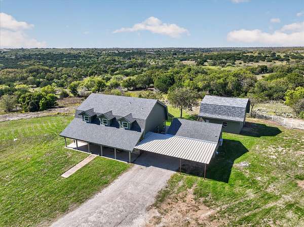 10 Acres of Land with Home for Sale in Cresson, Texas