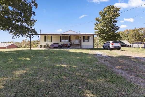 6.6 Acres of Land with Home for Sale in Marion, Kentucky