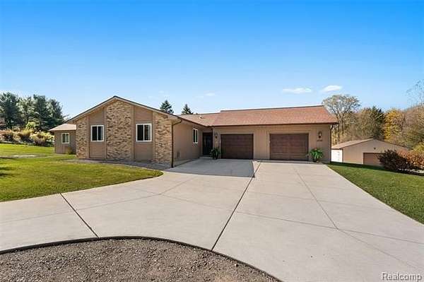 6 Acres of Land with Home for Sale in Oxford, Michigan