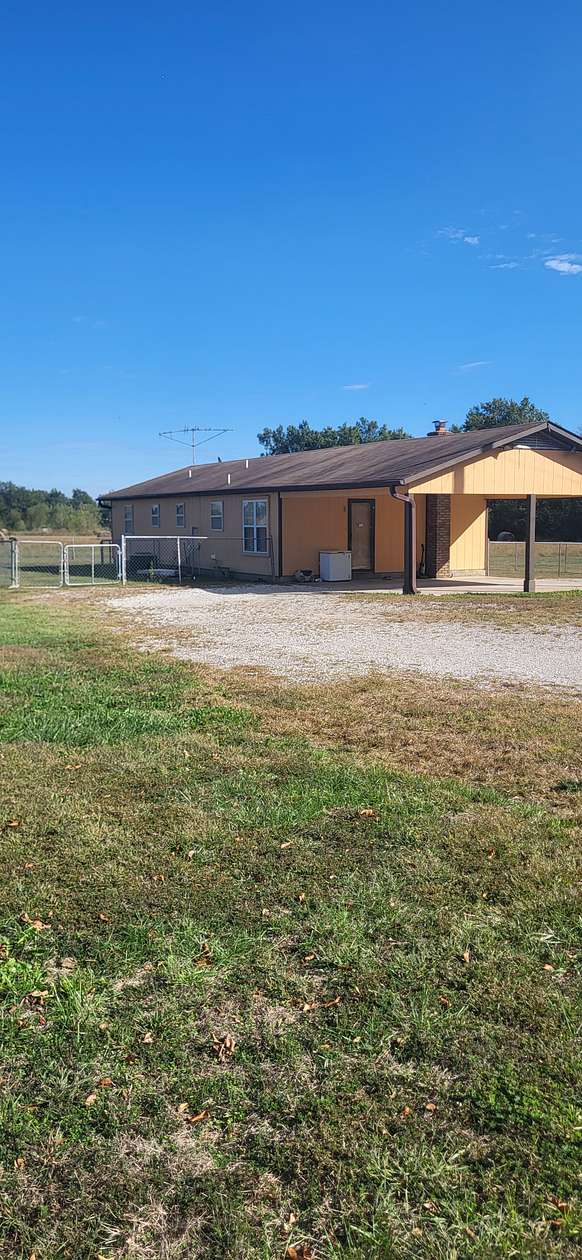 10 Acres of Land with Home for Auction in Miami, Oklahoma